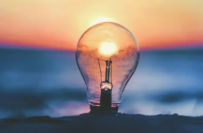 selective focus photography of light bulb